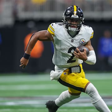 Sep 8, 2024; Atlanta, Georgia, USA; Pittsburgh Steelers quarterback Justin Fields (2) runs the ball against the Atlanta Falcons in the third quarter at Mercedes-Benz Stadium. Mandatory Credit: Brett Davis-Imagn Images