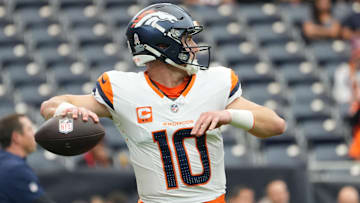 Nov 2, 2025; Houston, Texas, USA; Denver Broncos quarterback Bo Nix (10) warms up before a game against the Houston Texans at NRG Stadium.