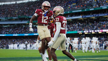 Aug 24, 2024; Dublin, IRL; Florida State University defensive back Edwin Joseph celebrates a tackle against Georgia Tech with defensive back Conrad Hussey at Aviva Stadium. Mandatory Credit: Tom Maher/INPHO via Imagn Images