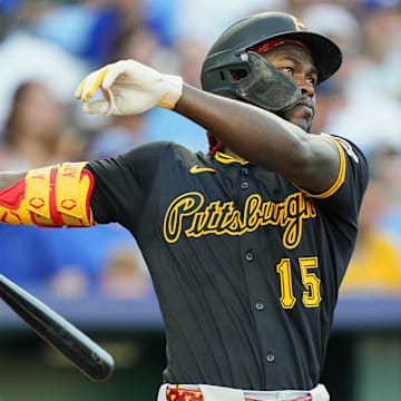 Jul 8, 2025; Kansas City, Missouri, USA; Pittsburgh Pirates center fielder Oneil Cruz (15) hits a home run during the fifth inning against the Kansas City Royals at Kauffman Stadium. Mandatory Credit: Jay Biggerstaff-Imagn Images