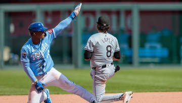 Apr 7, 2024; Kansas City, Missouri, USA; Kansas City Royals pinch runner Austin Nola (14) motions to the bench after stealing 2nd base during the eighth inning against the Chicago White Sox at Kauffman Stadium. Mandatory Credit: William Purnell-USA TODAY Sports