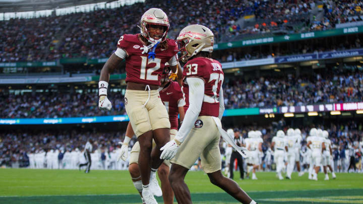 Aug 24, 2024; Dublin, IRL; Florida State University defensive back Edwin Joseph celebrates a tackle against Georgia Tech with defensive back Conrad Hussey at Aviva Stadium. Mandatory Credit: Tom Maher/INPHO via USA TODAY Sports