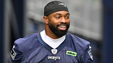 New England Patriots linebacker K'Lavon Chaisson (44) walks to the practice fields at Gillette Stadium.