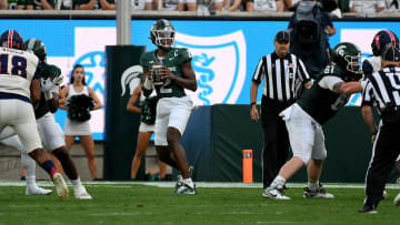 Aug 30, 2024; East Lansing, Michigan, USA;  Michigan State Spartans quarterback Aidan Chiles (2) looks for an open receiver during the game against the Florida Atlantic Owls at Spartan Stadium. Mandatory Credit: Dale Young-USA TODAY Sports