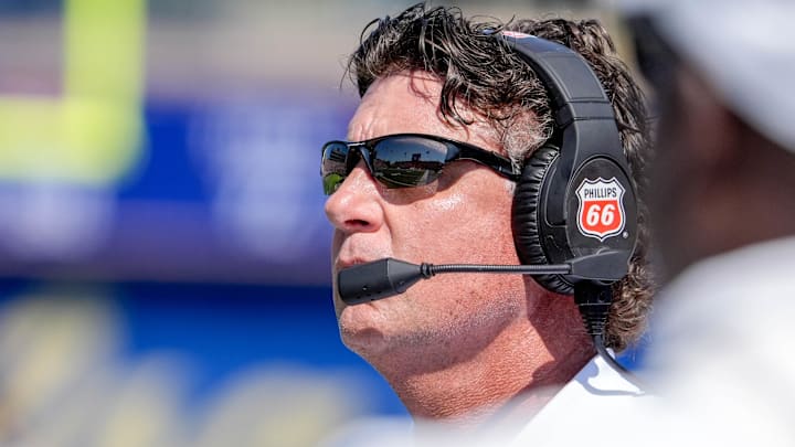 Oklahoma State head coach Mike Gundy looks at the scoreboard in the first half during an NCAA football game between Oklahoma State and Tulsa in Tulsa, Okla., on Saturday, Sept. 14, 2024.