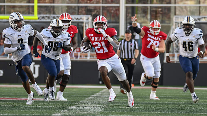 Indiana Hoosiers running back Elijah Green (21) runs for a touchdown against the Florida International Panthers during the second half at Memorial Stadium.