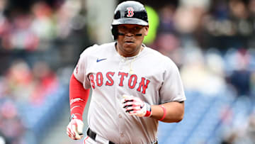 ; Boston Red Sox designated hitter Rafael Devers (11) rounds the bases after hitting a home run during the third inning against the Cleveland Guardians at Progressive Field.