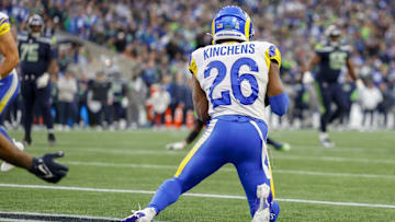 Nov 3, 2024; Seattle, Washington, USA; Los Angeles Rams safety Kamren Kinchens (26) intercepts a pass in the end zone against the Seattle Seahawks during the fourth quarter at Lumen Field. Kinchens would go on to return the interception for a touchdown. Mandatory Credit: Joe Nicholson-Imagn Images