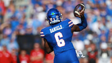 Kansas Jayhawks quarterback Jalon Daniels (6) throws the ball during the game between Fresno State and Kansas at David Booth Kansas Memorial Stadium.