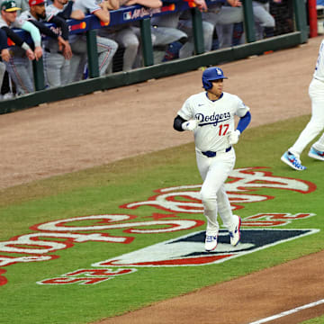 Jul 15, 2025; Cumberland, Georgia, USA; National League designated hitter Shohei Ohtani (17) of the Los Angeles Dodgers runs to home plate to score a run during the first inning during the 2025 MLB All Star Game at Truist Park. Mandatory Credit: Jordan Godfree-Imagn Images