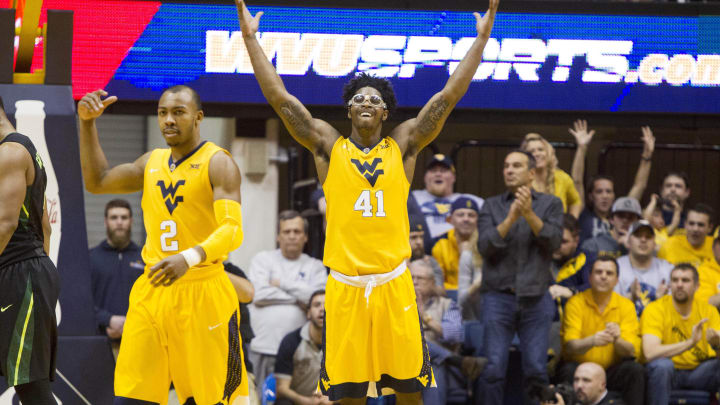 West Virginia Mountaineers forward Devin Williams (41) celebrates after a defensive stop during the second half against the Baylor Bears at the WVU Coliseum. 