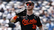 Jun 21, 2025; Bronx, New York, USA; Baltimore Orioles outfielder Ryan O'Hearn (32) warms up before a game against the New York Yankees at Yankee Stadium