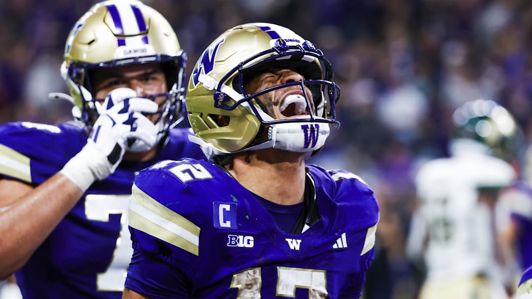 Aug 30, 2025; Seattle, Washington, USA; Washington Huskies wide receiver Denzel Boston (12) celebrates after catching a touchdown pass against the Colorado State Rams during the third quarter at Husky Stadium. Mandatory Credit: Joe Nicholson-Imagn Images
