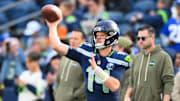 Nov 9, 2025; Seattle, Washington, USA; Seattle Seahawks quarterback Sam Darnold (14) warms up before the game against the Arizona Cardinals  at Lumen Field. Mandatory Credit: Steven Bisig-Imagn Images