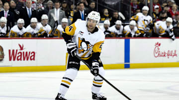 Apr 11, 2025; Newark, New Jersey, USA; Pittsburgh Penguins defenseman Matt Grzelcyk (24) controls the puck during the third period against the New Jersey Devils at Prudential Center. Mandatory Credit: John Jones-Imagn Images