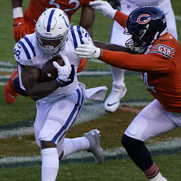 Colts running back Jonathan Taylor looks to break free against the Bears in his rookie year during a 19-11 Colts win.