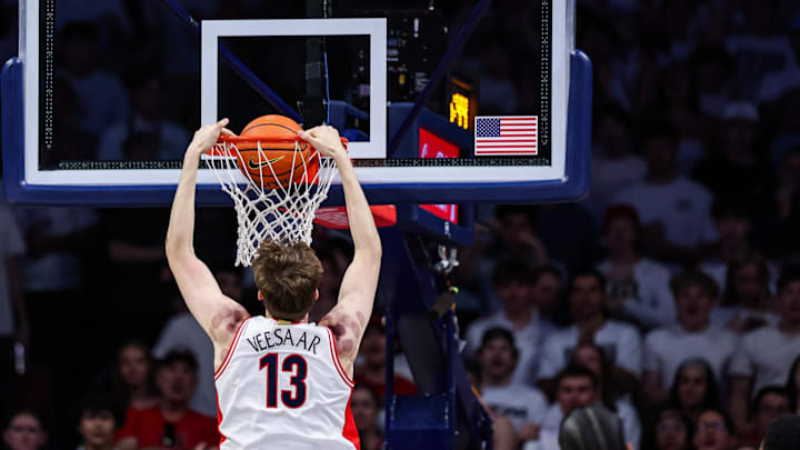 Feb 15, 2025; Tucson, Arizona, USA; Arizona Wildcats forward Henri Veesaar (13) dunks the ball against the Houston Cougars during the first half at McKale Center. Mandatory Credit: Aryanna Frank-Imagn Images