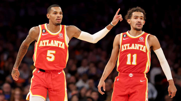 Nov 2, 2022; New York, New York, USA; Atlanta Hawks guard Dejounte Murray (5) and guard Trae Young (11) react during the second quarter against the New York Knicks at Madison Square Garden. 