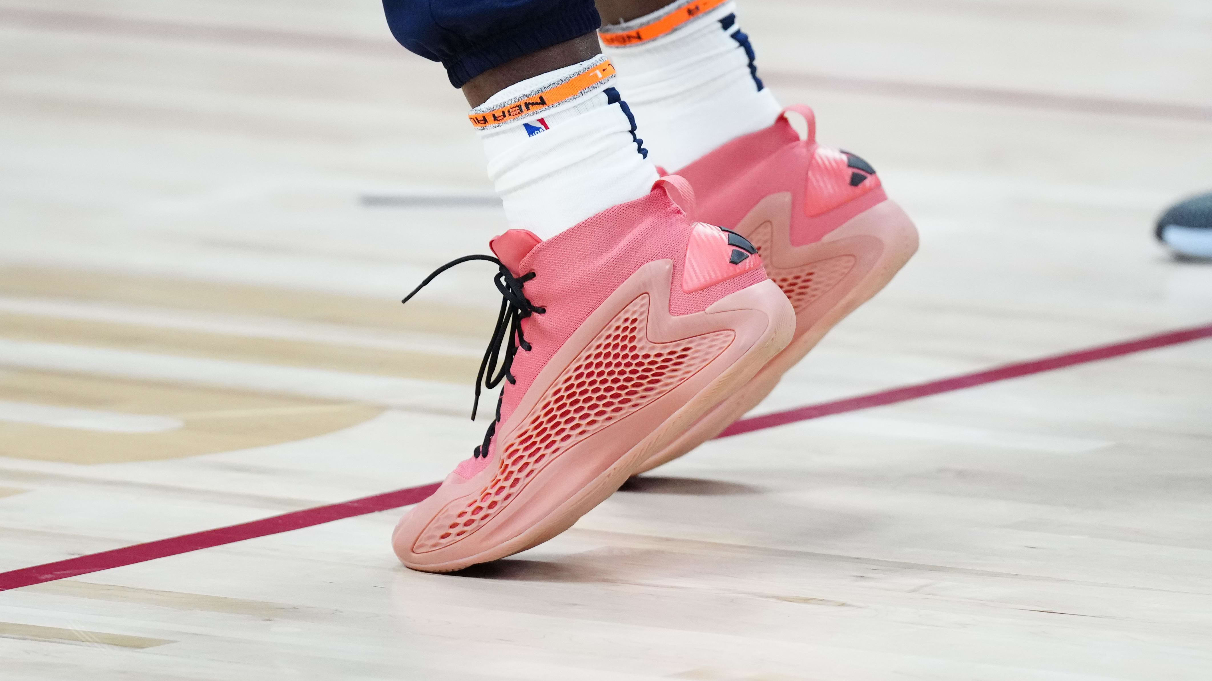 Minnesota Timberwolves guard Anthony Edwards' red adidas shoes.