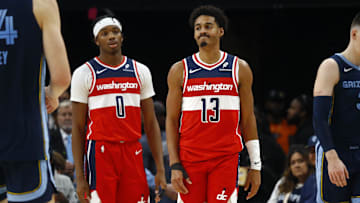 Nov 8, 2024; Memphis, Tennessee, USA; Washington Wizards guard Bilal Coulibaly (0) and guard Jordan Poole (13) react during the first half against the Memphis Grizzlies at FedExForum. Mandatory Credit: Petre Thomas-Imagn Images
