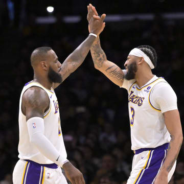Mar 24, 2024; Los Angeles, California, USA; Los Angeles Lakers forward LeBron James (23) and forward Anthony Davis (3) high-five after a play in the first half against the Indiana Pacers at Crypto.com Arena. Mandatory Credit: Jayne Kamin-Oncea-USA TODAY Sports