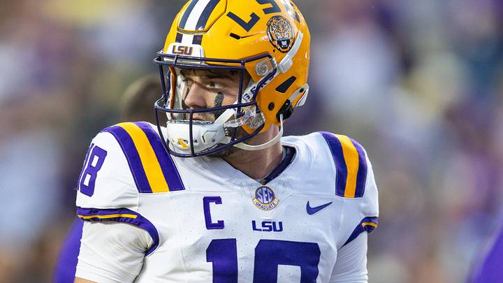 Oct 11, 2025; Baton Rouge, Louisiana, USA;  LSU Tigers quarterback Garrett Nussmeier (18) against the South Carolina Gamecocks during the first half at Tiger Stadium. Mandatory Credit: Stephen Lew-Imagn Images