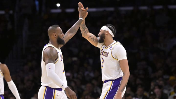 Mar 24, 2024; Los Angeles, California, USA; Los Angeles Lakers forward LeBron James (23) and forward Anthony Davis (3) high-five after a play in the first half against the Indiana Pacers at Crypto.com Arena. Mandatory Credit: Jayne Kamin-Oncea-USA TODAY Sports