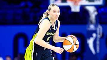 Jul 30, 2025; Arlington, Texas, USA;  Dallas Wings guard Paige Bueckers (5) dribbles against the Atlanta Dream during the second half at College Park Center. Mandatory Credit: Kevin Jairaj-Imagn Images
