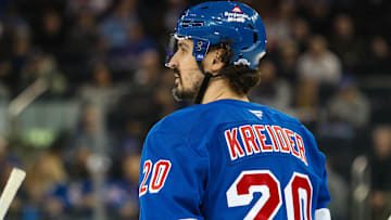 Mar 22, 2025; New York, New York, USA; New York Rangers left wing Chris Kreider (20) skates against the Vancouver Canucks during the third period at Madison Square Garden. Mandatory Credit: Danny Wild-Imagn Images