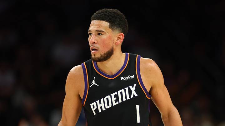 Apr 27, 2026; Phoenix, Arizona, USA; Phoenix Suns guard Devin Booker (1) against the Oklahoma City Thunder during game four of the first round of the 2026 NBA Playoffs at Mortgage Matchup Center. Mandatory Credit: Mark J. Rebilas-Imagn Images