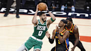 Jan 5, 2025; Oklahoma City, Oklahoma, USA;Boston Celtics forward Jayson Tatum (0) shoots the ball over Oklahoma City Thunder guard Shai Gilgeous-Alexander (2) during the third quarter at Paycom Center. Mandatory Credit: Alonzo Adams-Imagn Images