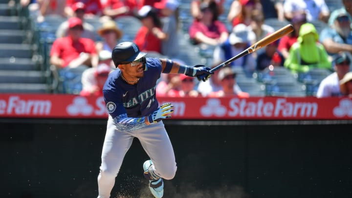 Seattle Mariners center fielder Julio Rodriguez (44) hits a single against the Los Angeles Angels during the sixth inning at Angel Stadium on July 14.