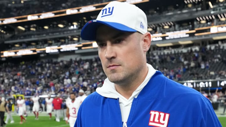 Dec 28, 2025; Paradise, Nevada, USA; Former New York Giants head coach Mike Kafka leaves the field after the game against the Las Vegas Raiders at Allegiant Stadium.