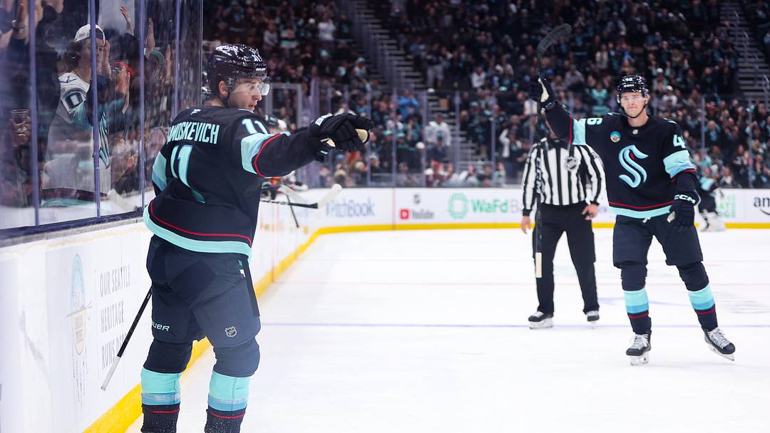 Oct 4, 2026; Seattle, Washington, USA; Seattle Kraken right wing Mackie Samoskevich (11) reacts after scoring a goal in the second period against the Calgary Flames at Climate Pledge Arena. Mandatory Credit: Kevin Ng-Imagn Images
