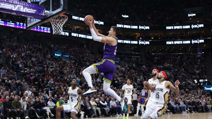 Nov 27, 2023; Salt Lake City, Utah, USA; Utah Jazz center Walker Kessler (24) lays the ball up against the New Orleans Pelicans in the second quarter at Delta Center. 