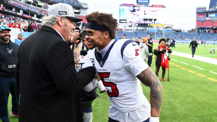 Dec 17, 2023; Nashville, Tennessee, USA; Houston Texans safety Jalen Pitre (5) celebrates with Texans CEO Cal McNair after an overtime win against the Tennessee Titans at Nissan Stadium. Mandatory Credit: Christopher Hanewinckel-USA TODAY Sports