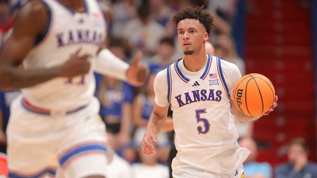Kansas Jayhawks guard Zeke Mayo (5) dribbles down court in the second half of the game against Washburn inside Allen Fieldhouse Tuesday, Oct. 29, 2024.