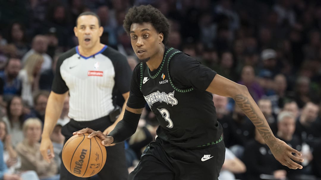 Mar 20, 2026; Minneapolis, Minnesota, USA; Minnesota Timberwolves forward Jaden McDaniels (3) dribbles the ball against the Portland Trail Blazers in the second half at Target Center. Mandatory Credit: Jesse Johnson-Imagn Images