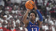 Kansas' guard Elmarko Jackson (13) shoots the ball against Texas Tech in a Big 12 basketball game, Monday, Feb. 12, 2024, at United Supermarkets Arena.