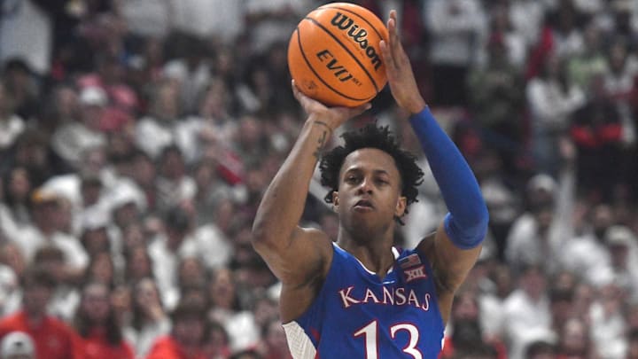 Kansas' guard Elmarko Jackson (13) shoots the ball against Texas Tech in a Big 12 basketball game, Monday, Feb. 12, 2024, at United Supermarkets Arena.