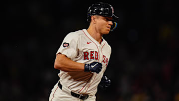 Sep 9, 2024; Boston, Massachusetts, USA; Boston Red Sox designated hitter Tyler O'Neill (17) hits a home run against the Baltimore Orioles in the eighth inning at Fenway Park. Mandatory Credit: David Butler II-Imagn Images