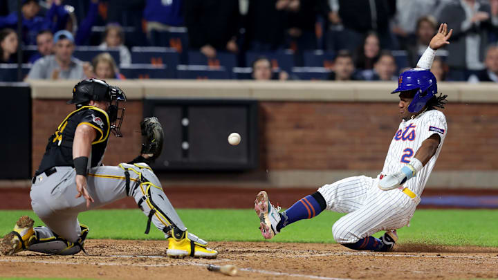 May 12, 2025; New York City, New York, USA; New York Mets second baseman Luisangel Acuna (2) scores ahead of the tag by Pittsburgh Pirates catcher Henry Davis (32) on a single by Mets first baseman Pete Alonso (not pictured) during the seventh inning at Citi Field. Mandatory Credit: Brad Penner-Imagn Images May 12, 2025; New York City, New York, USA; New York Mets second baseman Luisangel Acuna (2) scores ahead of the tag by Pittsburgh Pirates catcher Henry Davis (32) on a single by Mets first baseman Pete Alonso (not pictured) during the seventh inning at Citi Field. Mandatory Credit: Brad Penner-Imagn Images