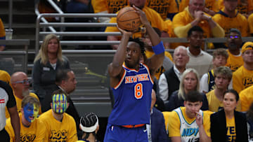 New York Knicks forward OG Anunoby (8) shoots a three point basket over Indiana Pacers guard Andrew Nembhard (2) during the first quarter of game three of the eastern conference finals for the 2025 NBA Playoffs at Gainbridge Fieldhouse.