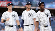 Sep 30, 2025; Bronx, New York, USA; New York Yankees first baseman Ben Rice (22) and third baseman Ryan McMahon (19) and second baseman Jazz Chisholm Jr. (13) stand on the field during player introductions before game one of the Wildcard round of the 2025 MLB playoffs against the Boston Red Sox at Yankee Stadium. Mandatory Credit: Brad Penner-Imagn Images