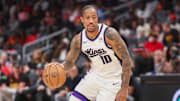 Nov 1, 2024; Atlanta, Georgia, USA; Sacramento Kings forward DeMar DeRozan (10) dribbles against the Atlanta Hawks in the first quarter at State Farm Arena. Mandatory Credit: Brett Davis-Imagn Images