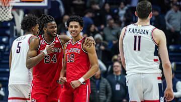 Feb 7, 2025; Storrs, Connecticut, USA;St. St. John's basketball forward Zuby Ejiofor (24) and guard RJ Luis Jr. (12) react after defeating the UConn Huskies in the second half at Harry A. Gampel Pavilion.