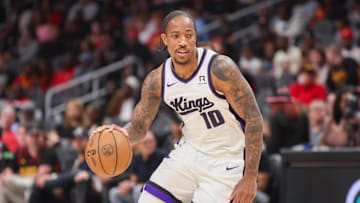 Nov 1, 2024; Atlanta, Georgia, USA; Sacramento Kings forward DeMar DeRozan (10) dribbles against the Atlanta Hawks in the first quarter at State Farm Arena. Mandatory Credit: Brett Davis-Imagn Images