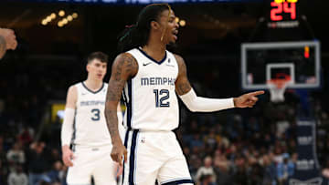 Dec 5, 2024; Memphis, Tennessee, USA; Memphis Grizzlies guard Ja Morant (12) reacts after a foul call toward an official, resulting in a technical foul, during the fourth quarter against the Sacramento Kings at FedExForum. Mandatory Credit: Petre Thomas-Imagn Images