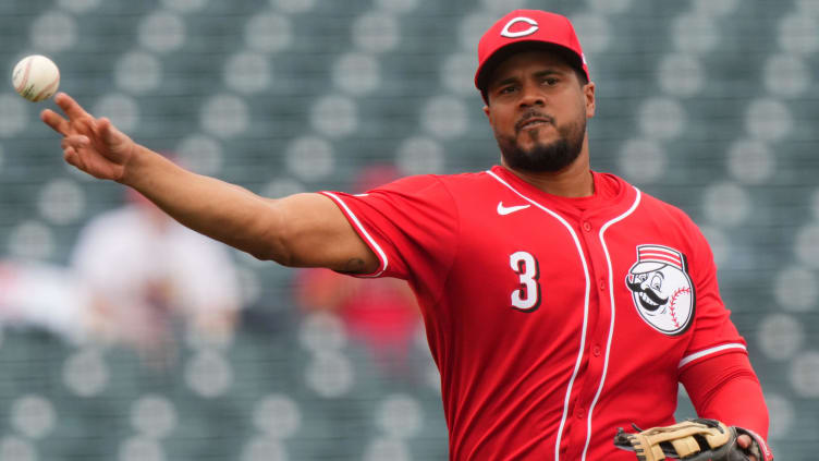 Cincinnati Reds third baseman Jeimer Candelario (3) throws to first