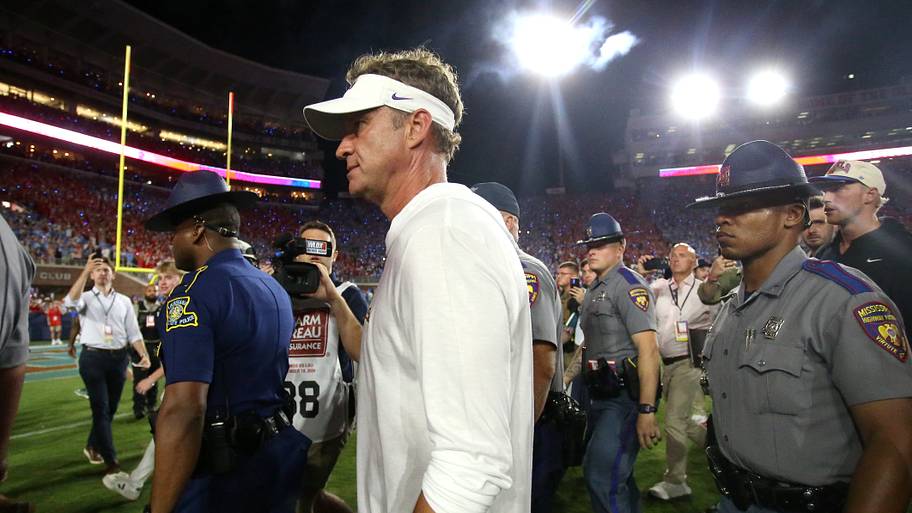 Louisiana State Tigers head coach Lane Kiffin walks off the field after a loss to the Mississippi Rebels.